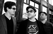 Les membres du groupe acadien Les Païens. Le bassiste Marc Arsenault a recruté des musiciens locaux pour préparer un CD de bienfaisance pour sensibiliser les gens à la restauration de la rivière.